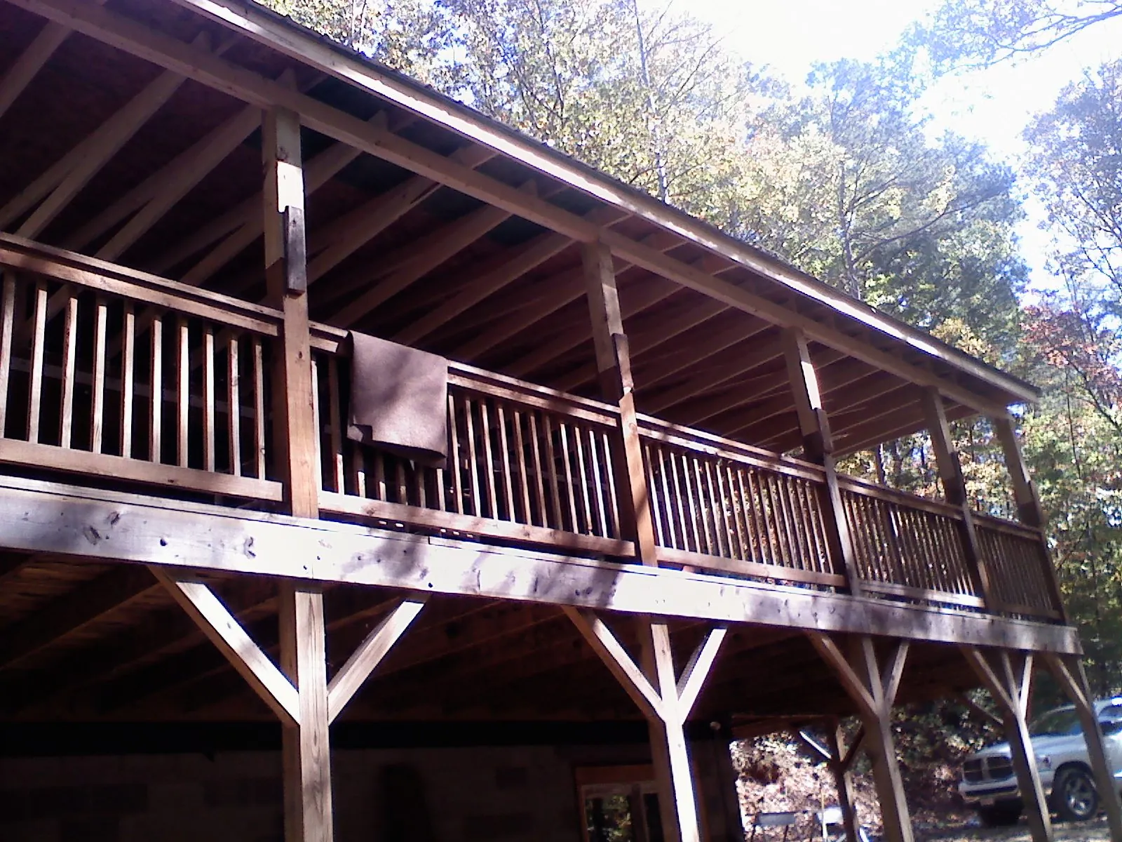 Timber framing under a new elevated porch and deck — Roof Leak Repair in Minot by Roofing Brothers